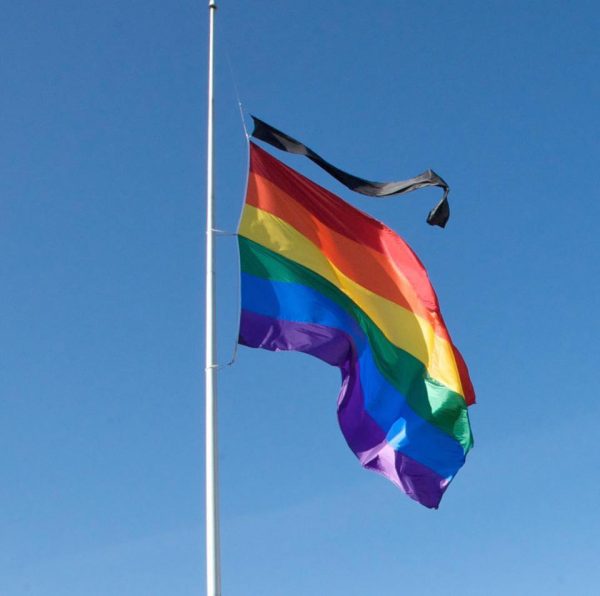 rainbow-flag-half-mast-black-ribbon